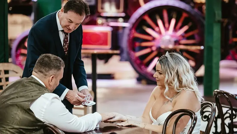 Wedding guests reacting to magic performance